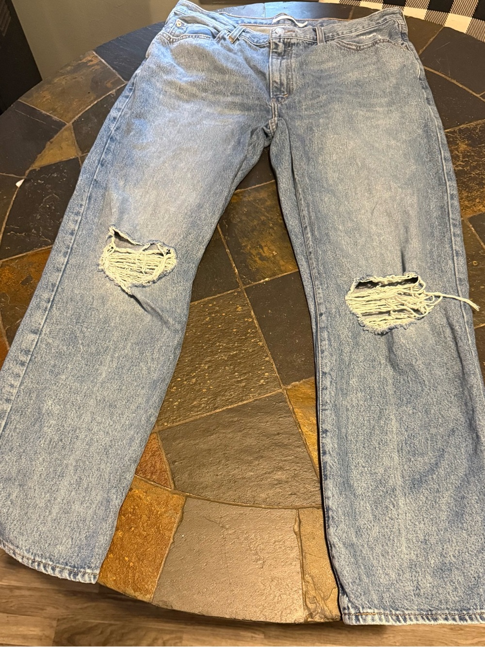 Relaxed Light Blue Ripped Men’s Jeans